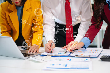 Asian business team working on digital marketing strategy, data analytics, SEO, and e-commerce reports in modern office