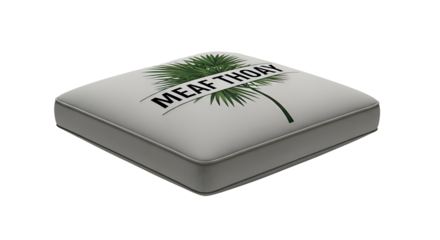 Square, light grey cushion with an illegible tropical design