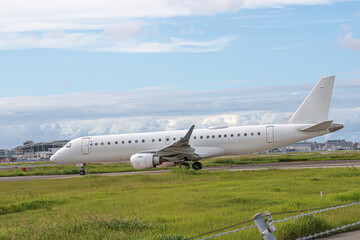 Silhouette of airplane at Fukuoka Airport sunset
