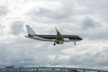 Landing aircraft over the city of Fukuoka