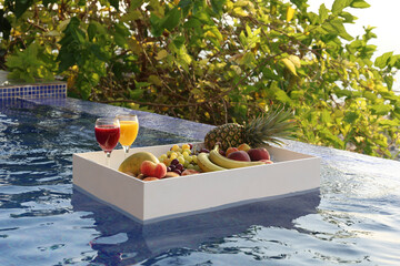 Floating Tray with Fruits in Pool