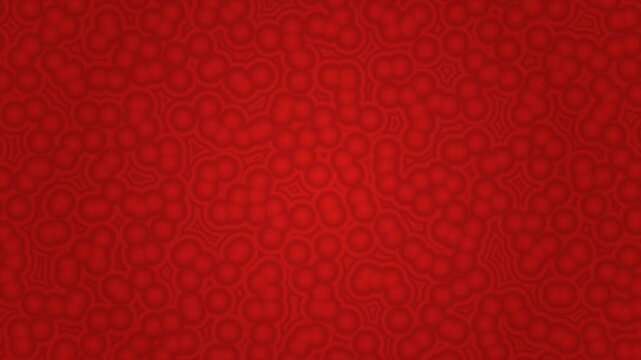 Abstract red pattern resembling cells or circular shapes. Perfect for medical, science, or technology projects needing a dynamic design element.