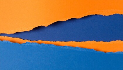 Torn layers of orange, dark blue, and light blue collide in textured visual contrast.