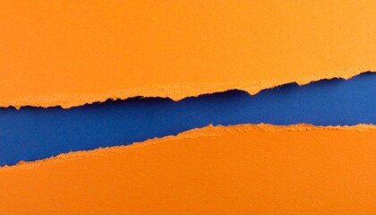 Torn layers of orange, dark blue, and light blue collide in textured visual contrast.