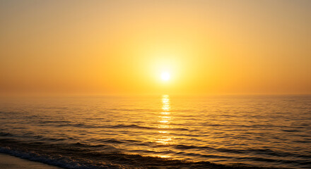 Fototapeta premium Golden Sunrise over Foggy Sea