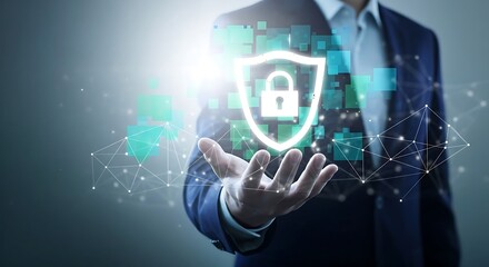 Businessman holding a glowing digital shield with a padlock symbol representing cybersecurity data protection and network security concepts