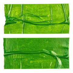 Abstract green textured material wrapped with string and tape.