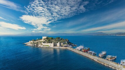 Aerial View of Pigeon Island (Güvercinada) in Kusadasi, Turkey – Historic Fortress Surrounded by the Aegean Sea under Light Clouds