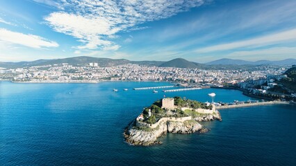 Aerial View of Pigeon Island (Güvercinada) in Kusadasi, Turkey – Historic Fortress Surrounded by the Aegean Sea under Light Clouds