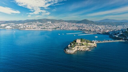 Aerial View of Pigeon Island (Güvercinada) in Kusadasi, Turkey – Historic Fortress Surrounded by the Aegean Sea under Light Clouds