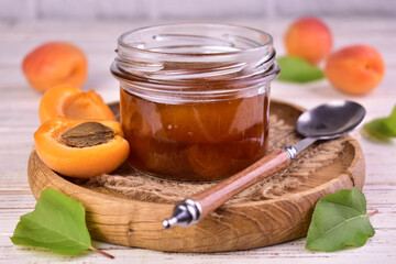 Homemade apricot jam in a jar. Apricot jam.
