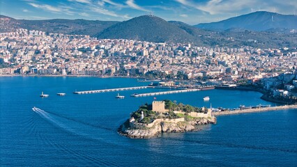Aerial View of Pigeon Island (Güvercinada) in Kusadasi, Turkey – Historic Fortress Surrounded by the Aegean Sea under Light Clouds