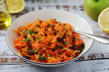 A bowl with traditional Polish carrot salad  © nastyakamysheva