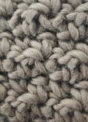 Fondo de textura de superficie de punto con hilos de lana de color gris 