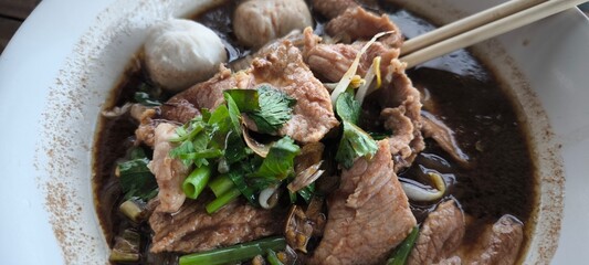 Pork waterfall noodles is a Thai dish.