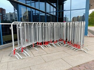 Metal barriers in front of a modern office building in the city