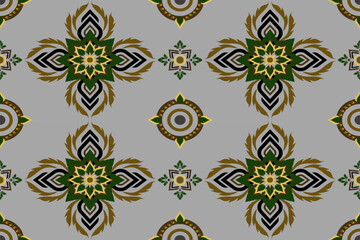 Seamless mandala pattern with green and gold floral ornaments on gray background, perfect for home decor, textile design, and modern wallpaper.