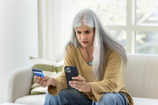 Stressed annoyed Hispanic bank client woman feeling mad - Powered by Adobe