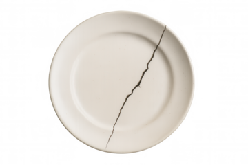 Breaking white ceramic plate showing a diagonal crack signaling damage, conflict, end of relationship, separation on transparent background
