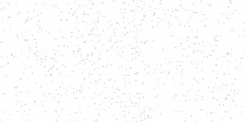 Abstract background with scattered light gray particles on a white backdrop