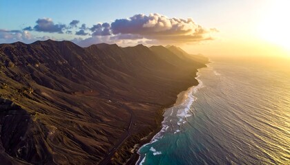 Aerial view of a volcanic coastline at sunset