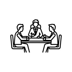 Business meeting with three people sitting around a table discussing work.