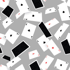 Seamless pattern. Vector illustration of playing cards floating in the air. Spade, heart, club, and diamond aces in dynamic arrangement. For poker, casino, gambling, entertainment, graphic projects.