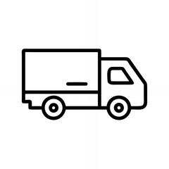 Fototapeta premium Delivery Truck Driving Along a City Street at Sunset Hour
