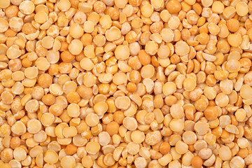 Dry yellow split peas background