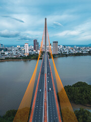 Symmetric modern cable-stayed bridge over Han River in Da Nang, Contemporary urban span connecting...