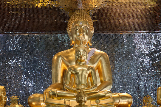 Closeup view of a golden Buddha at Wat phuttha prommayan, Chachoengsao Province Thailand