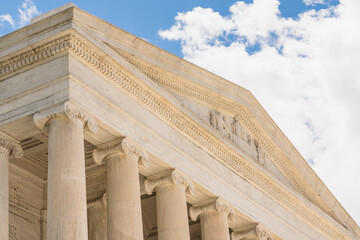  A close-up view of the Jefferson Memorial shows its intricate pediment sculpture and marble columns.