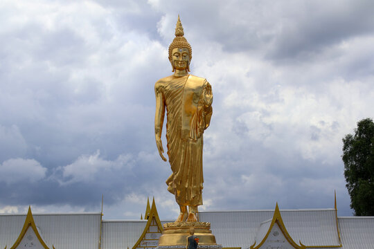Close up view of Golden Buddha statue at Wat phuttha prommayan, Chachoengsao Province Thailand.