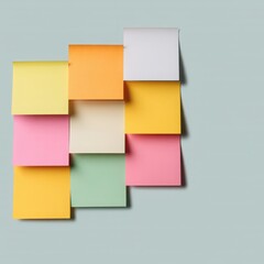 Fototapeta premium Colorful sticky notes arranged on a wall reminders and organization office or home use