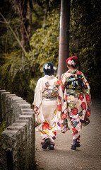 two women dressed in kimonos in Kyoto, Japan