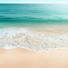 The ocean is calm and the water is a beautiful shade of blue. The beach is empty and the waves are gentle