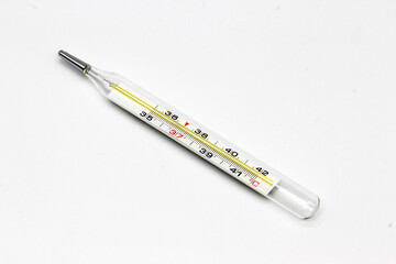 Mercury medical thermometer isolated on white background.