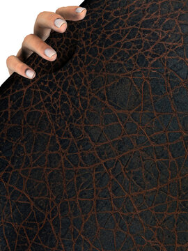 Elegant Macro View of Hand Bending Smooth Brown Leather Texture with Visible Grain and Luxurious Pattern on Exclusive Background