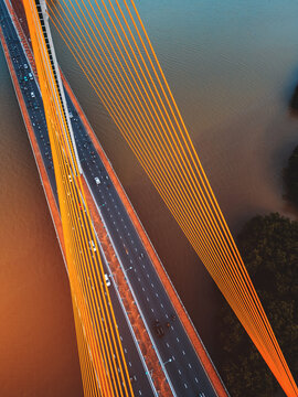 Symmetric modern cable-stayed bridge over rive, Contemporary urban span connecting city across waterway
