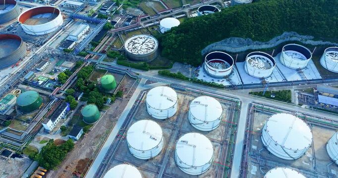 Aerial shot of  large chemical storage tank farm in industrial zone.
