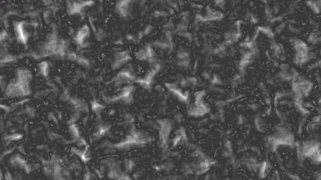 An animated dark gray texture that continuously morphs and shifts, resembling organic material, smoke, or molten stone. The soft dynamic movement creates a natural fluid illusion.