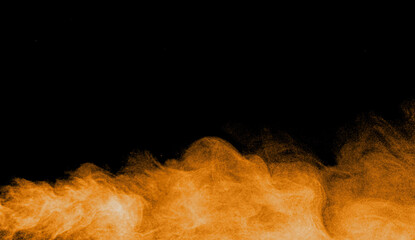 Orange powder smoke cloud on black background, abstract dust explosion texture for graphic design, fire effect, festival color burst, or background element for creative digital art.