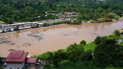 Naklejka premium village near the big river in Thailand