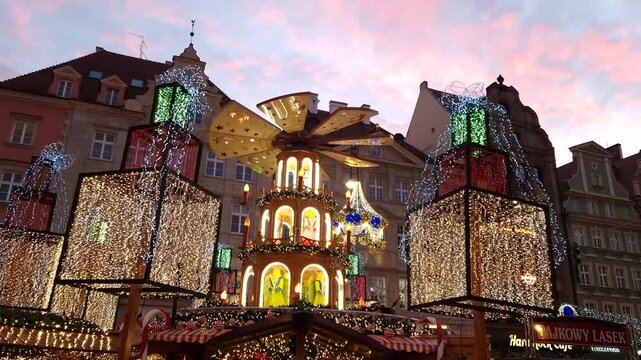 Wroclaw, Poland   December 18, 2023: Christmas Fair.  Tourists are walking at market square in Wroclaw. Poland