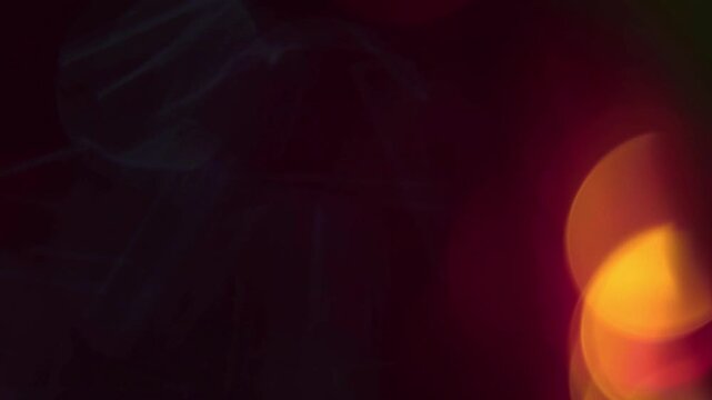 Artistic bokeh light leak overlay with smooth cinematic depth and glowing tone.