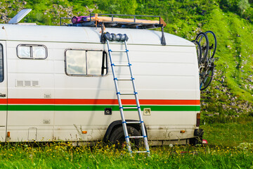 Caravan with ladder. Camper equipment.
