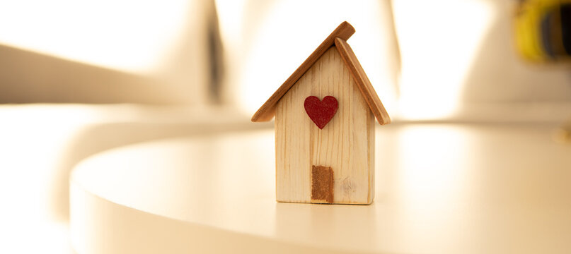 wooden house model on the table