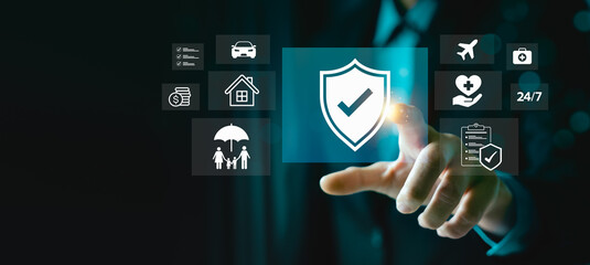 Digital insurance services and financial protection concept with businessman hand pointing at...