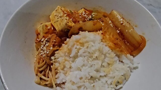 a piece of cake,,Kimchi jjigae or Kimchi soup served with rice
Korean kimchi stew.Korean traditional food