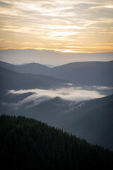 Beautiful mountain landscape, light over peaks and valleys, natural scenery, calm atmosphere and wild nature